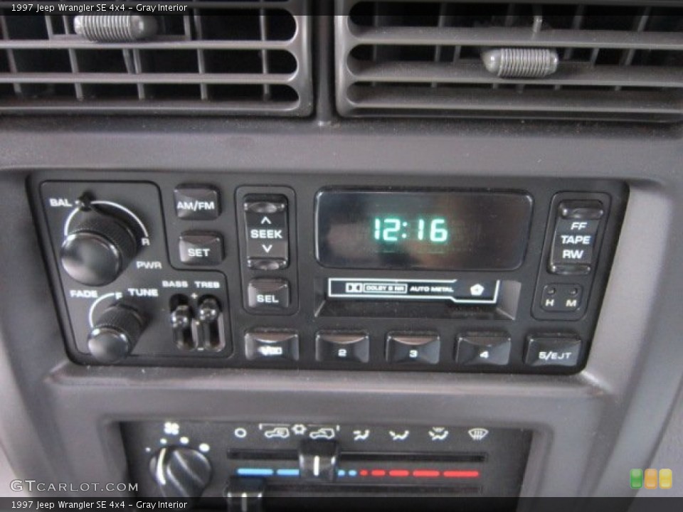 Gray Interior Audio System for the 1997 Jeep Wrangler SE 4x4 #52825367