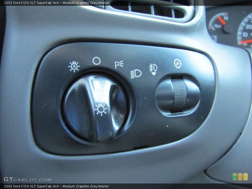 Medium Graphite Grey Interior Controls for the 2003 Ford F150 XLT SuperCab 4x4 #52830887
