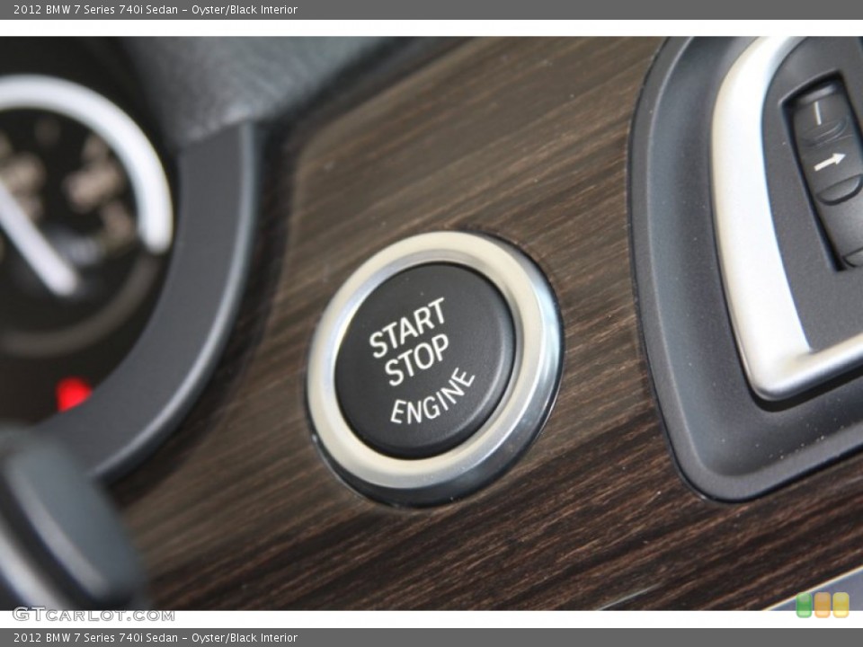 Oyster/Black Interior Controls for the 2012 BMW 7 Series 740i Sedan #52868001