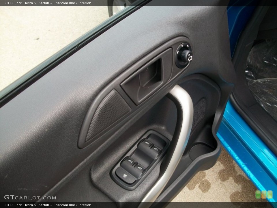 Charcoal Black Interior Controls for the 2012 Ford Fiesta SE Sedan #52881372