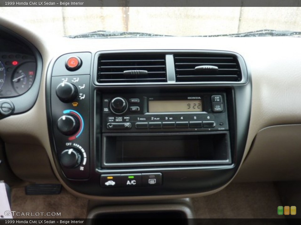 Beige Interior Audio System for the 1999 Honda Civic LX Sedan #52900188
