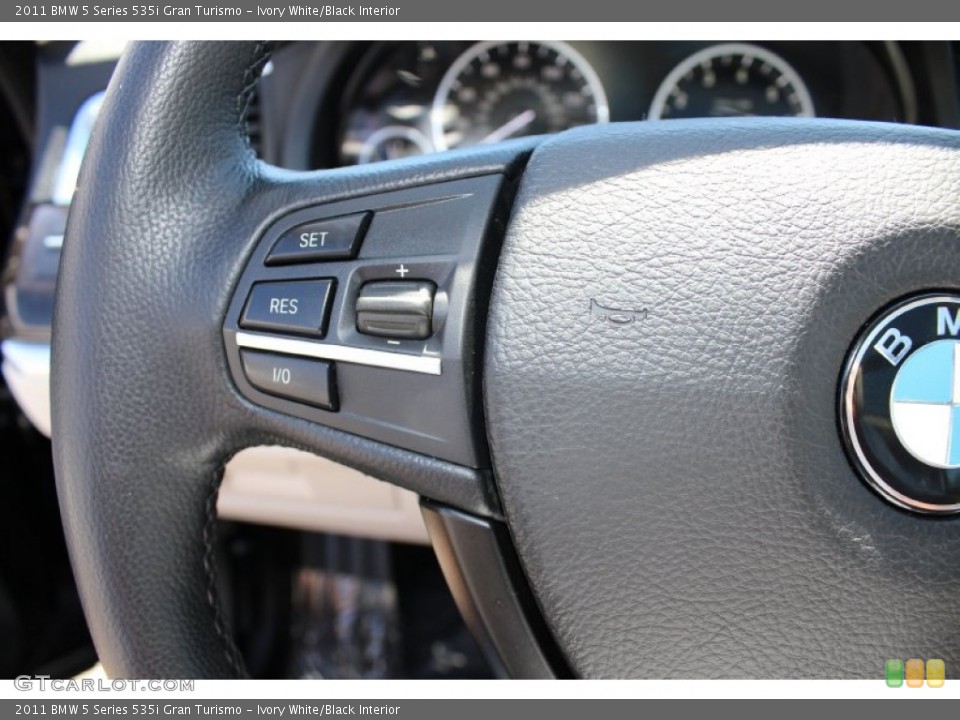 Ivory White/Black Interior Controls for the 2011 BMW 5 Series 535i Gran Turismo #52909065