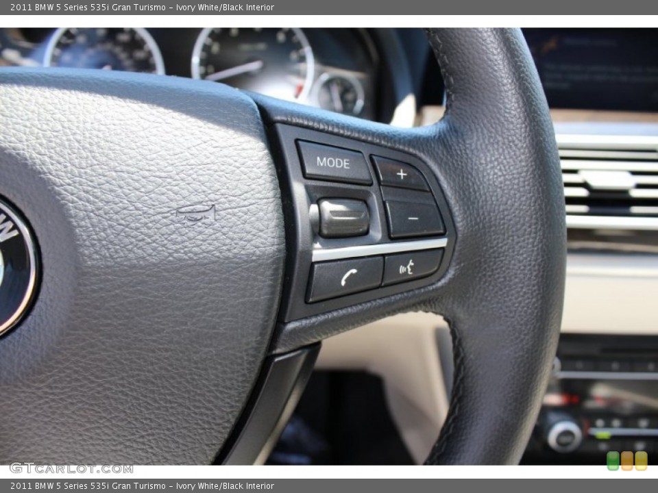 Ivory White/Black Interior Controls for the 2011 BMW 5 Series 535i Gran Turismo #52909077