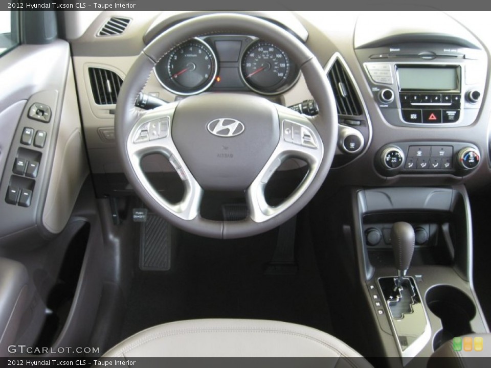 Taupe Interior Dashboard for the 2012 Hyundai Tucson GLS #52923334