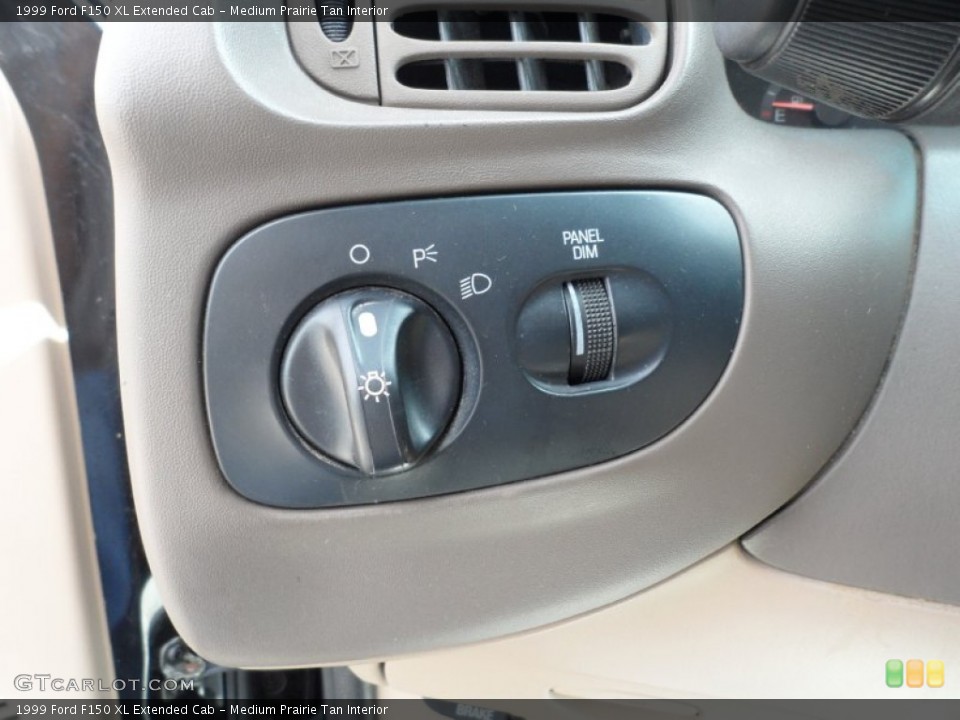 Medium Prairie Tan Interior Controls for the 1999 Ford F150 XL Extended Cab #52925899