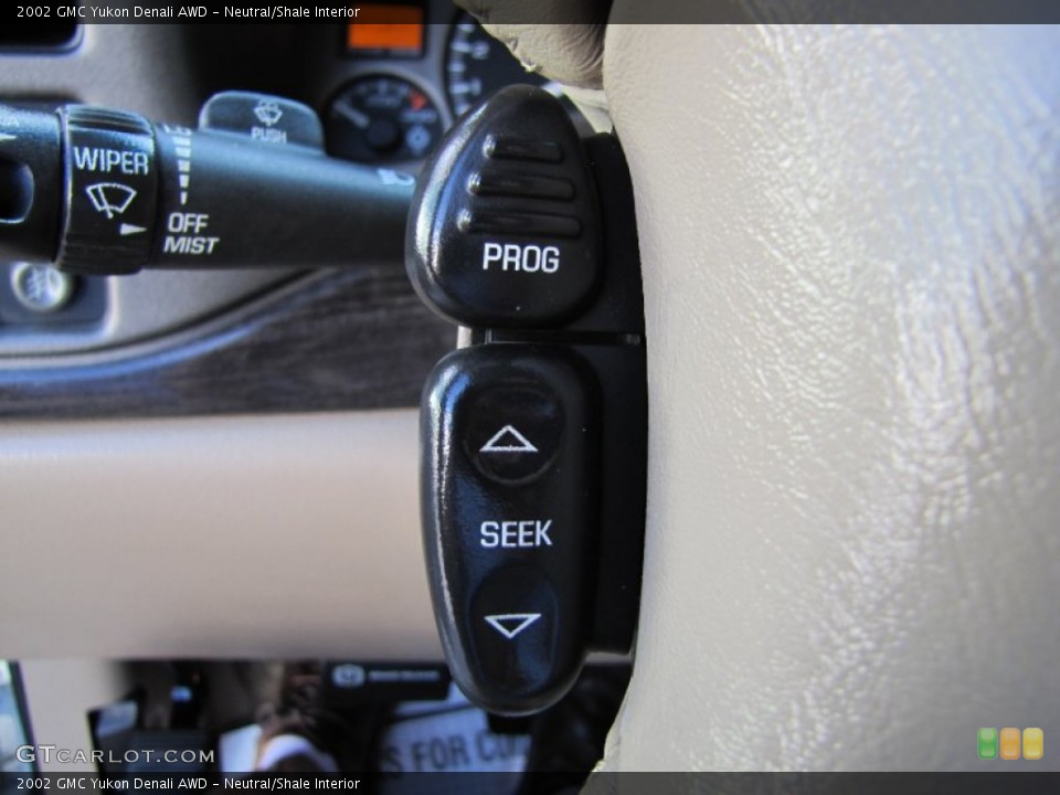 Neutral/Shale Interior Controls for the 2002 GMC Yukon Denali AWD #52934643