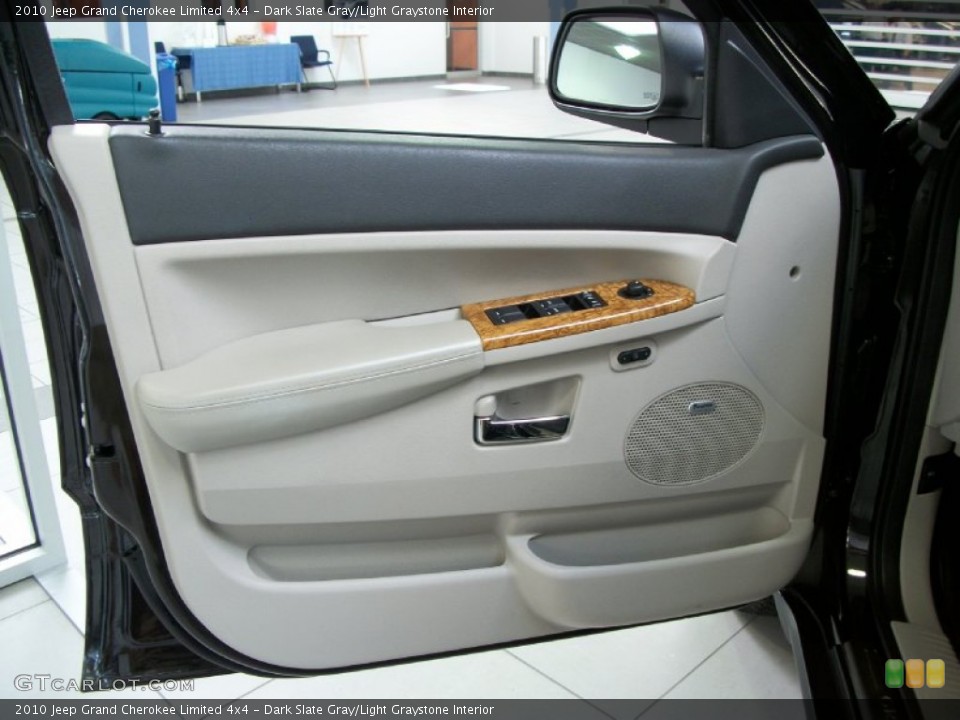 Dark Slate Gray/Light Graystone Interior Door Panel for the 2010 Jeep Grand Cherokee Limited 4x4 #52944084