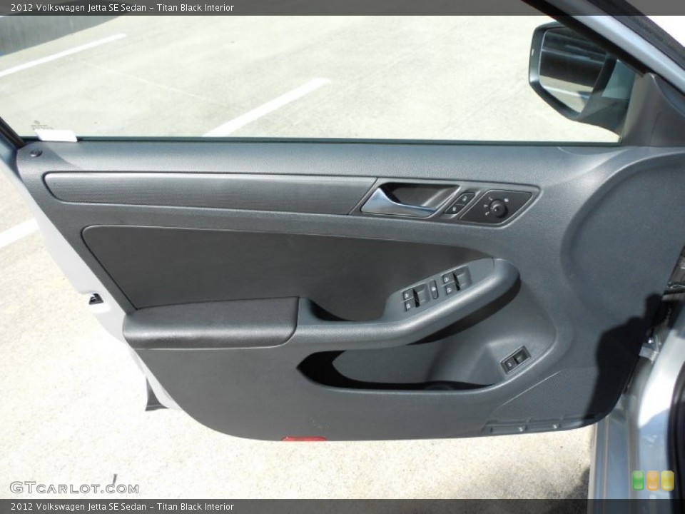 Titan Black Interior Door Panel for the 2012 Volkswagen Jetta SE Sedan #52949421