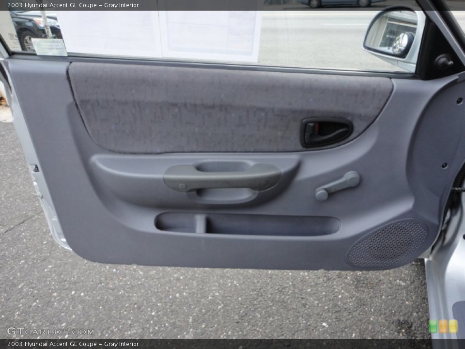 Gray Interior Door Panel for the 2003 Hyundai Accent GL Coupe #52955979