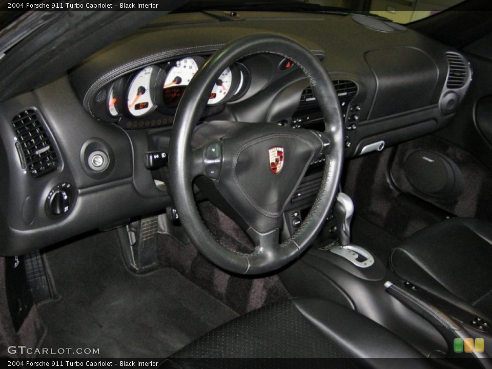 Black Interior Dashboard for the 2004 Porsche 911 Turbo Cabriolet #52985974