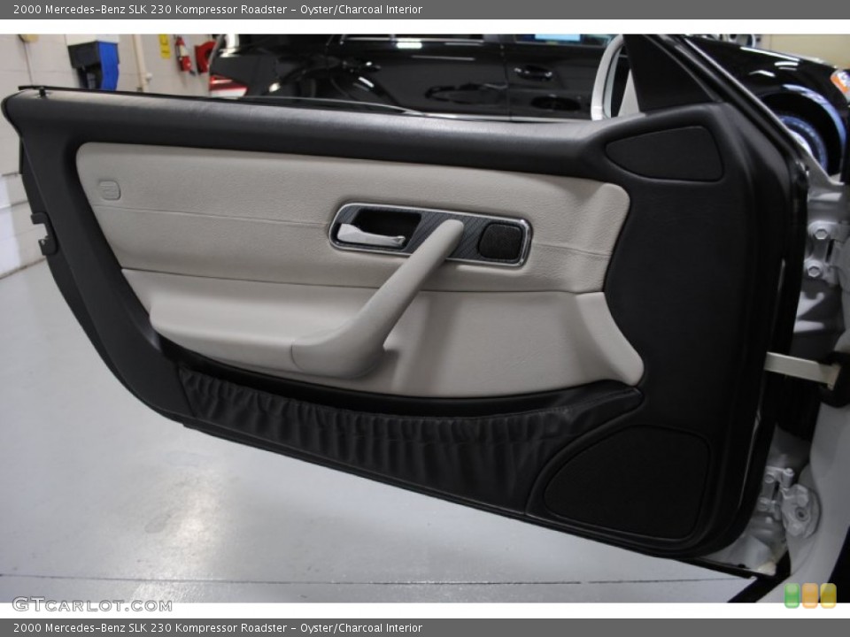 Oyster/Charcoal Interior Door Panel for the 2000 Mercedes-Benz SLK 230 Kompressor Roadster #52997077