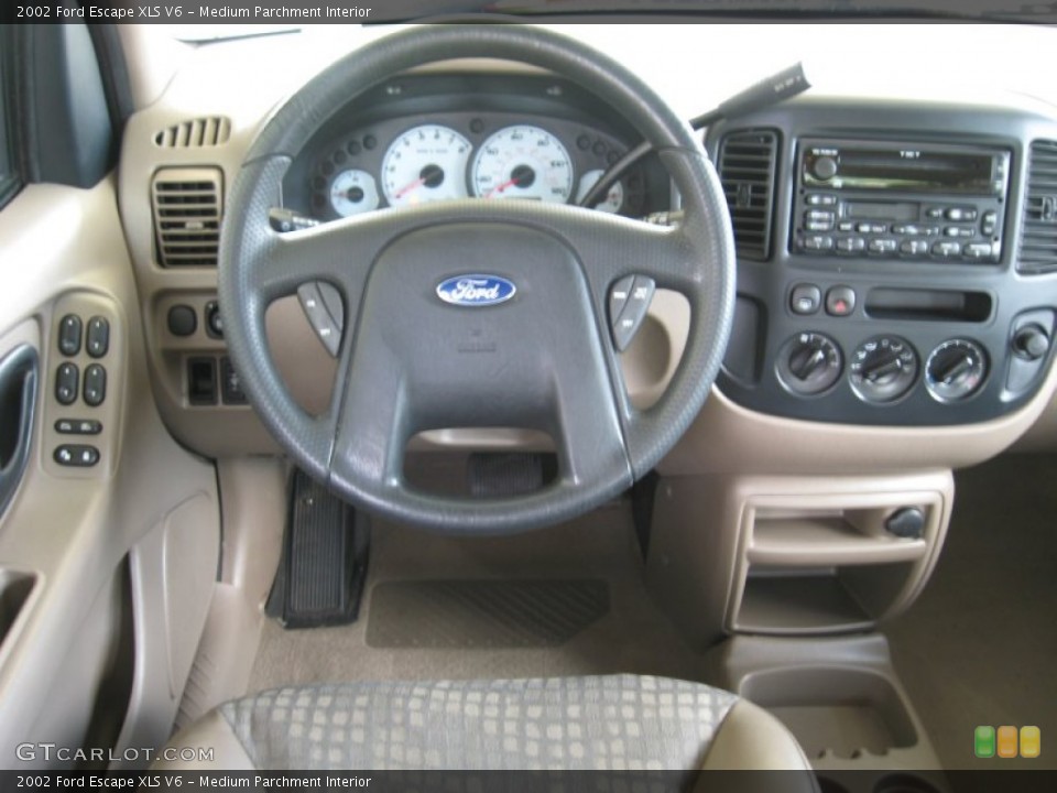 Medium Parchment Interior Dashboard for the 2002 Ford Escape XLS V6 #53035907