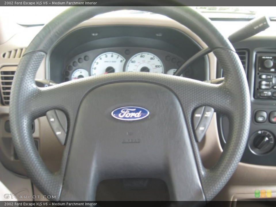 Medium Parchment Interior Steering Wheel for the 2002 Ford Escape XLS V6 #53035991