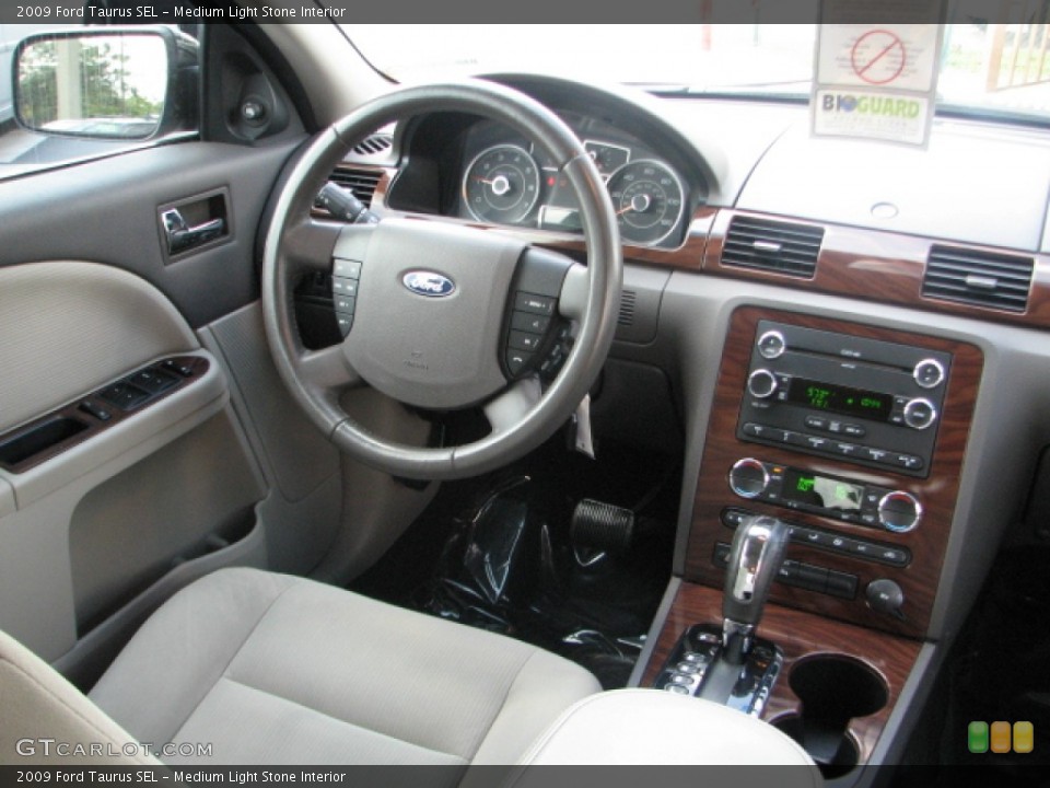 Medium Light Stone Interior Dashboard for the 2009 Ford Taurus SEL #53046023