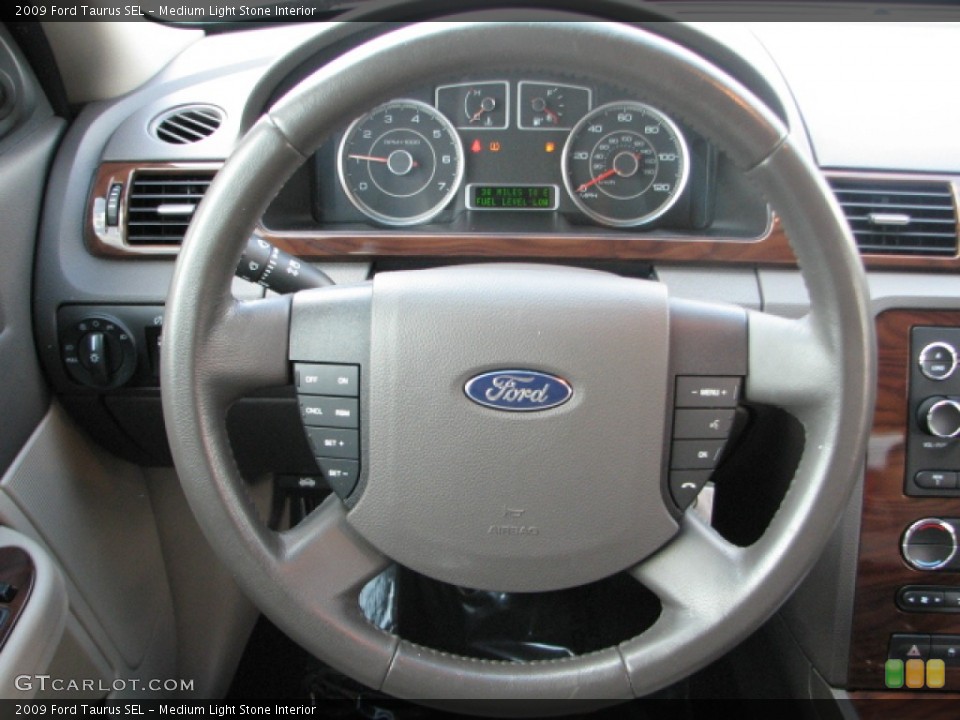 Medium Light Stone Interior Steering Wheel for the 2009 Ford Taurus SEL #53046032