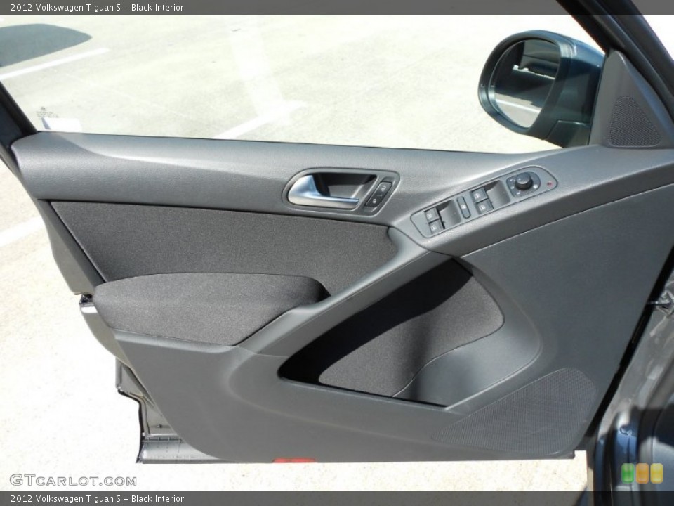 Black Interior Door Panel for the 2012 Volkswagen Tiguan S #53046602