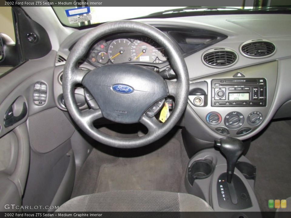Medium Graphite Interior Dashboard for the 2002 Ford Focus ZTS Sedan #53048837