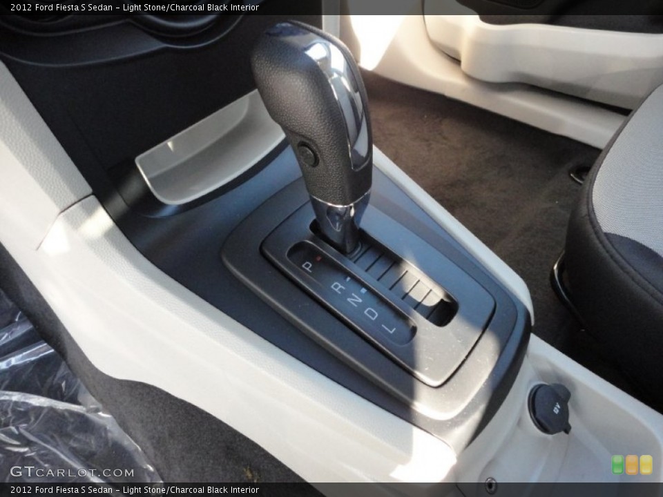 Light Stone/Charcoal Black Interior Transmission for the 2012 Ford Fiesta S Sedan #53083279