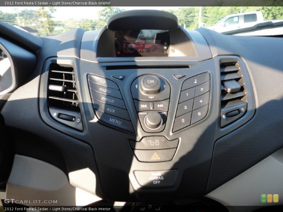 Light Stone/Charcoal Black Interior Controls for the 2012 Ford Fiesta S Sedan #53083372