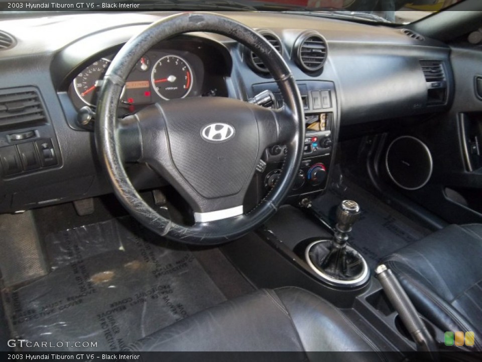 Black Interior Dashboard for the 2003 Hyundai Tiburon GT V6 #53090027
