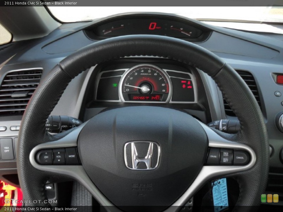 Black Interior Steering Wheel for the 2011 Honda Civic Si Sedan #53097398