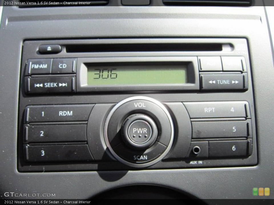 Charcoal Interior Controls for the 2012 Nissan Versa 1.6 SV Sedan #53111825