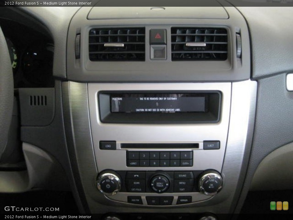 Medium Light Stone Interior Controls for the 2012 Ford Fusion S #53128932