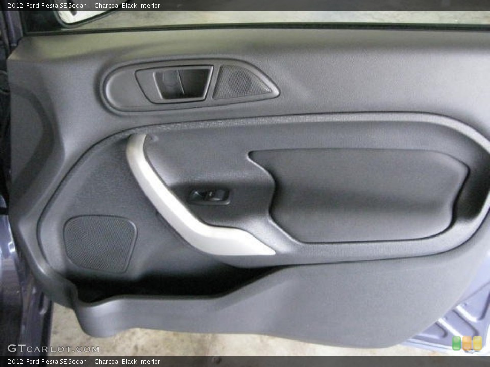 Charcoal Black Interior Door Panel for the 2012 Ford Fiesta SE Sedan #53130370