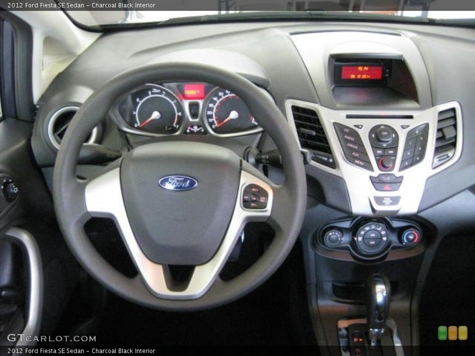Charcoal Black Interior Dashboard for the 2012 Ford Fiesta SE Sedan #53130400