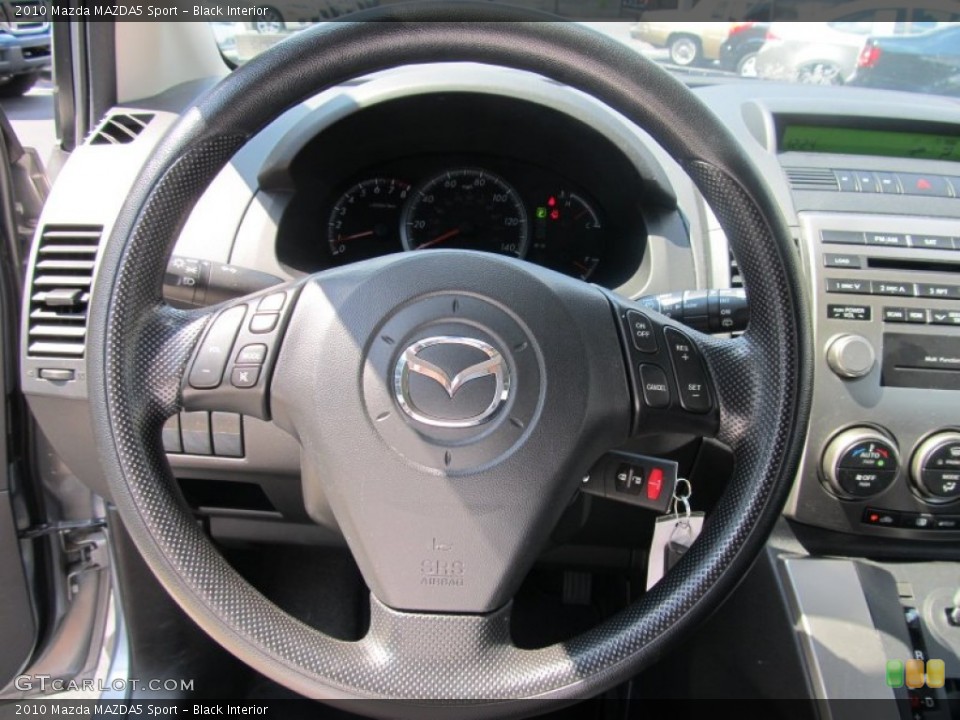 Black Interior Steering Wheel for the 2010 Mazda MAZDA5 Sport #53137477