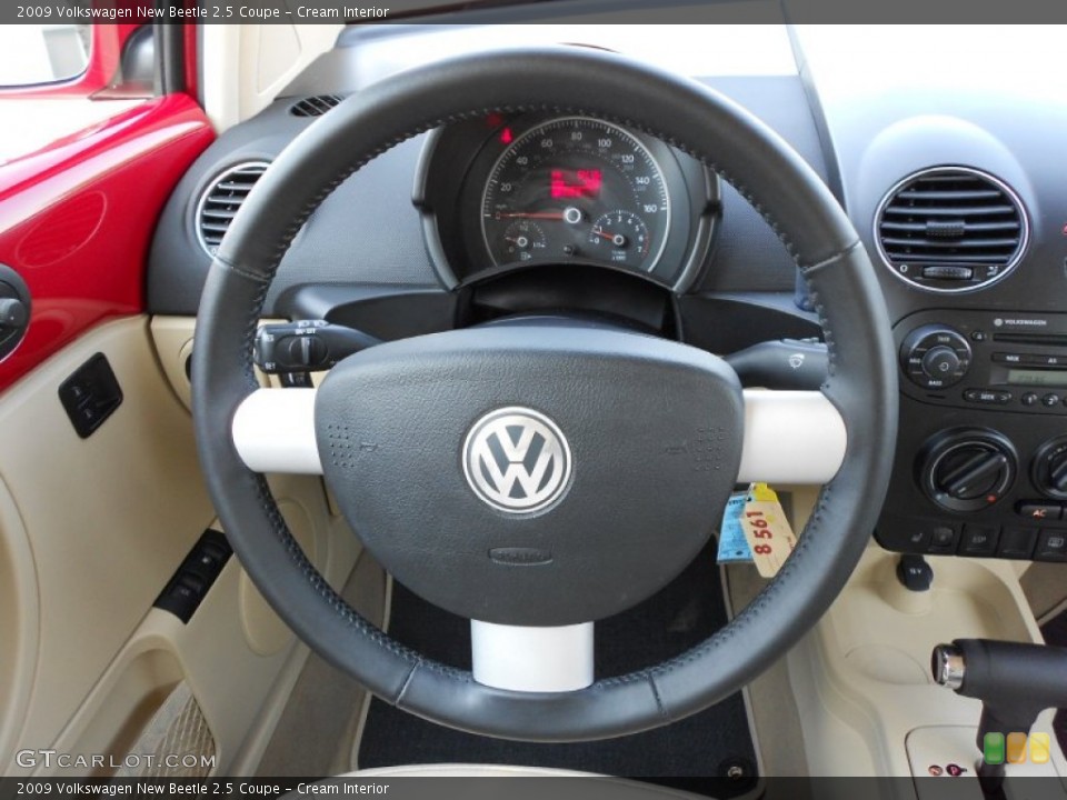 Cream Interior Steering Wheel for the 2009 Volkswagen New Beetle 2.5 Coupe #53138754