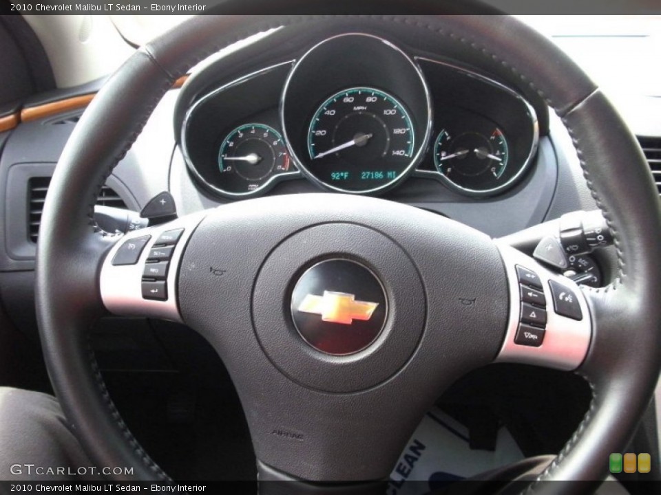 Ebony Interior Steering Wheel for the 2010 Chevrolet Malibu LT Sedan #53182070