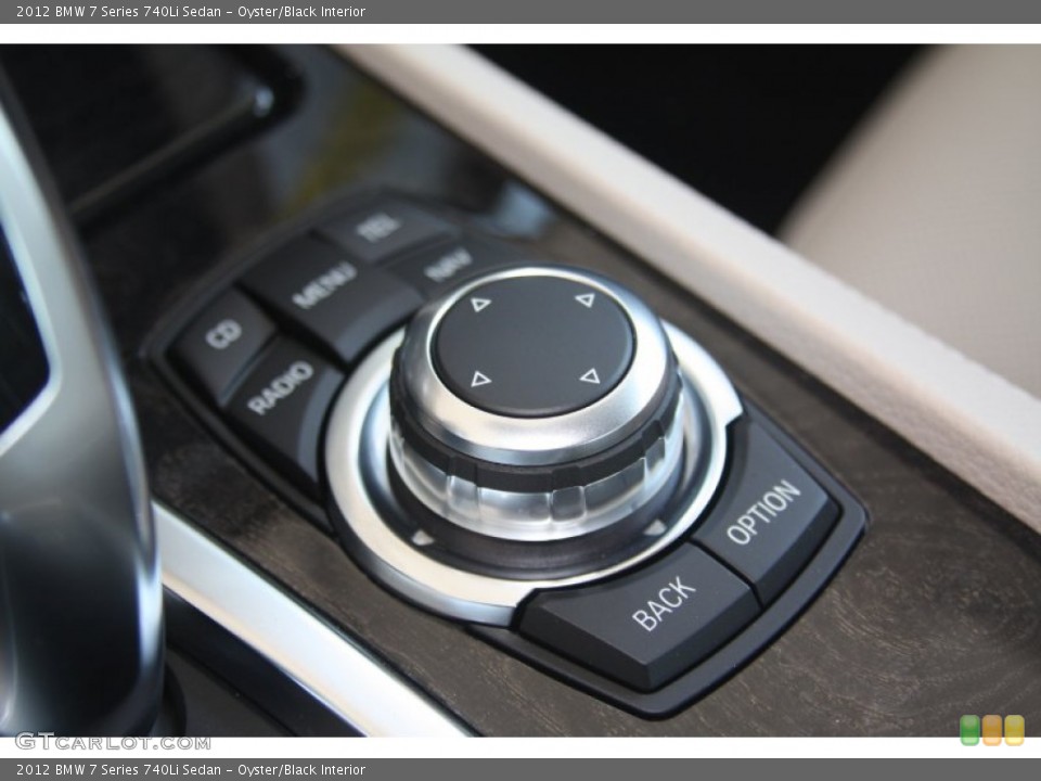 Oyster/Black Interior Controls for the 2012 BMW 7 Series 740Li Sedan #53242815