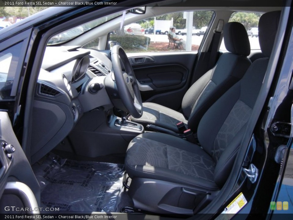Charcoal Black/Blue Cloth Interior Photo for the 2011 Ford Fiesta SEL Sedan #53329575