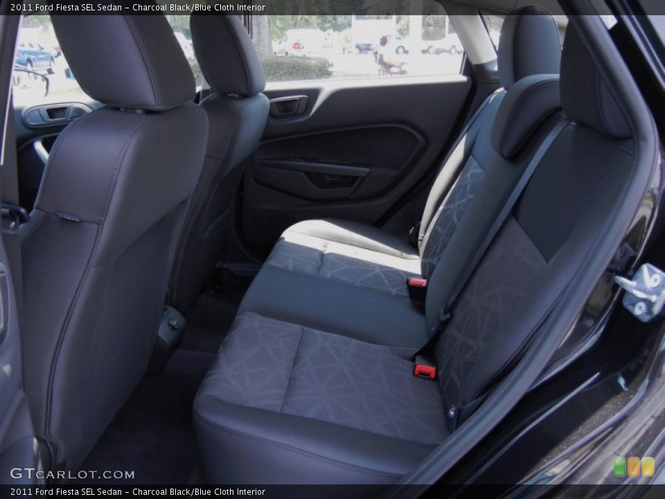 Charcoal Black/Blue Cloth Interior Photo for the 2011 Ford Fiesta SEL Sedan #53329602