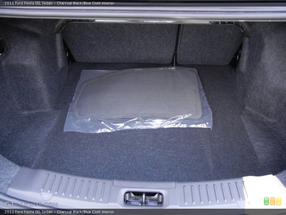 Charcoal Black/Blue Cloth Interior Trunk for the 2011 Ford Fiesta SEL Sedan #53329656