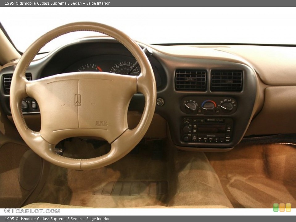 Beige Interior Dashboard for the 1995 Oldsmobile Cutlass Supreme S Sedan #53353036