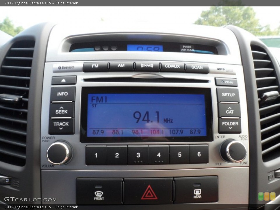 Beige Interior Controls for the 2012 Hyundai Santa Fe GLS #53383166