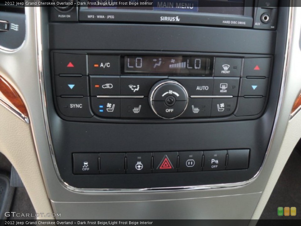 Dark Frost Beige/Light Frost Beige Interior Controls for the 2012 Jeep Grand Cherokee Overland #53389859