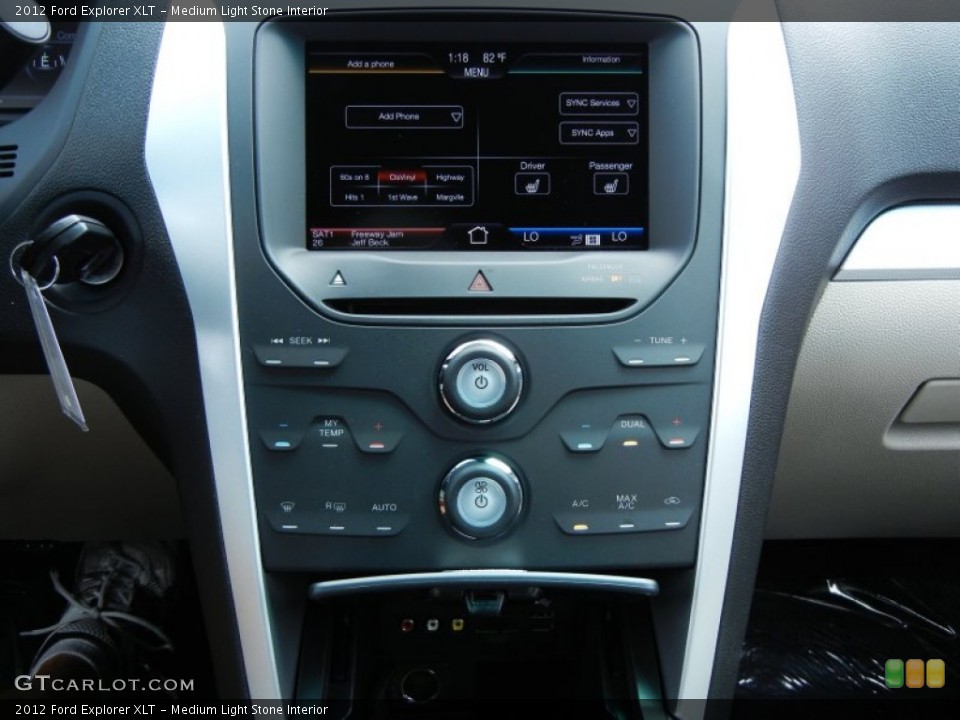 Medium Light Stone Interior Controls for the 2012 Ford Explorer XLT #53412412