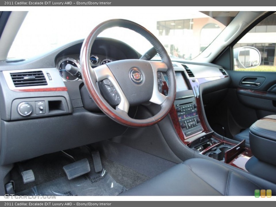 Ebony/Ebony Interior Dashboard for the 2011 Cadillac Escalade EXT Luxury AWD #53454740