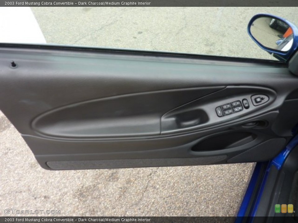 Dark Charcoal/Medium Graphite Interior Door Panel for the 2003 Ford Mustang Cobra Convertible #53489248