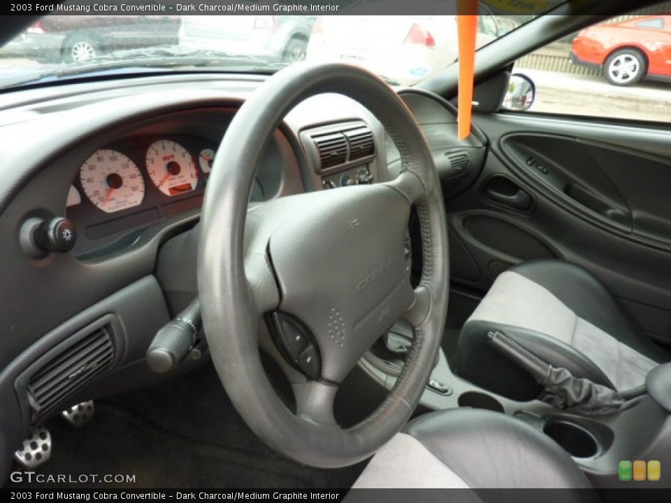 Dark Charcoal/Medium Graphite Interior Steering Wheel for the 2003 Ford Mustang Cobra Convertible #53489272