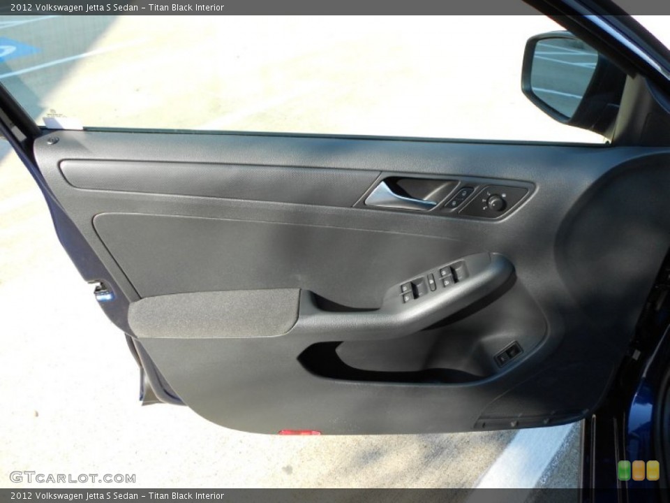 Titan Black Interior Door Panel for the 2012 Volkswagen Jetta S Sedan #53536489