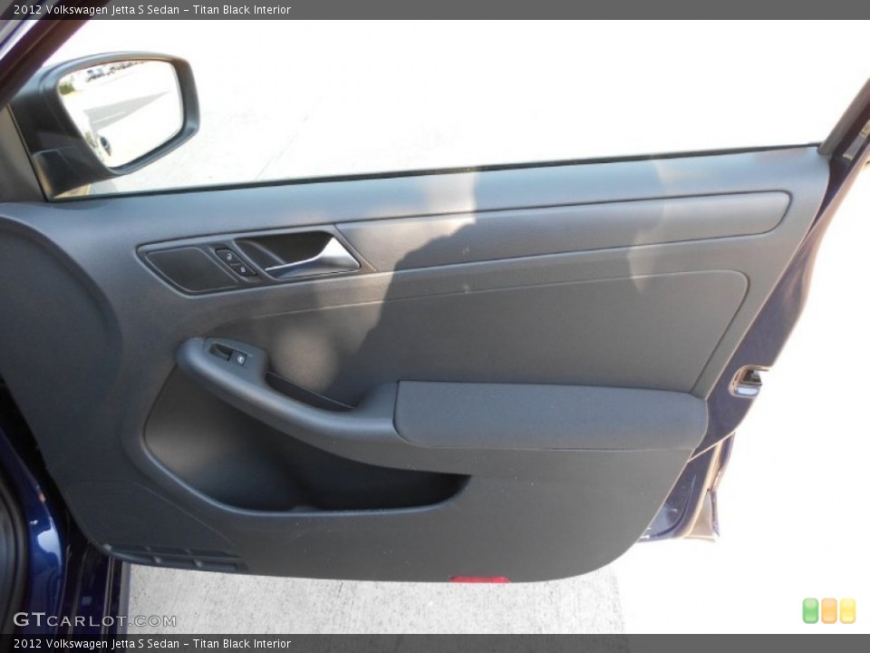 Titan Black Interior Door Panel for the 2012 Volkswagen Jetta S Sedan #53536520