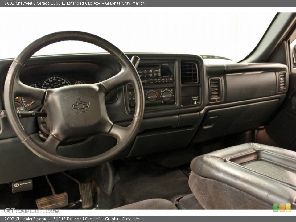 Graphite Gray Interior Dashboard for the 2002 Chevrolet Silverado 1500 LS Extended Cab 4x4 #53545541