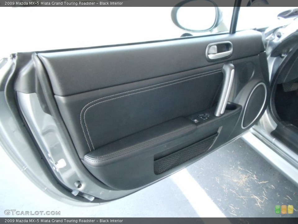 Black Interior Door Panel for the 2009 Mazda MX-5 Miata Grand Touring Roadster #53548658