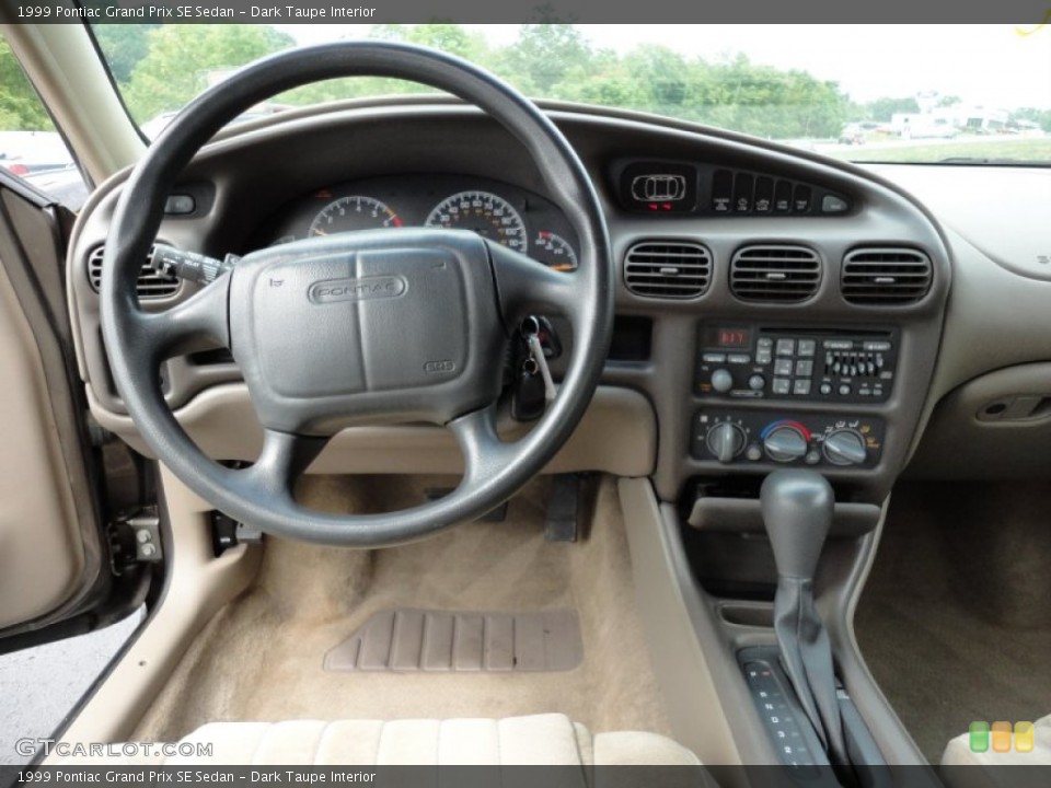 Dark Taupe Interior Dashboard for the 1999 Pontiac Grand Prix SE Sedan #53582049