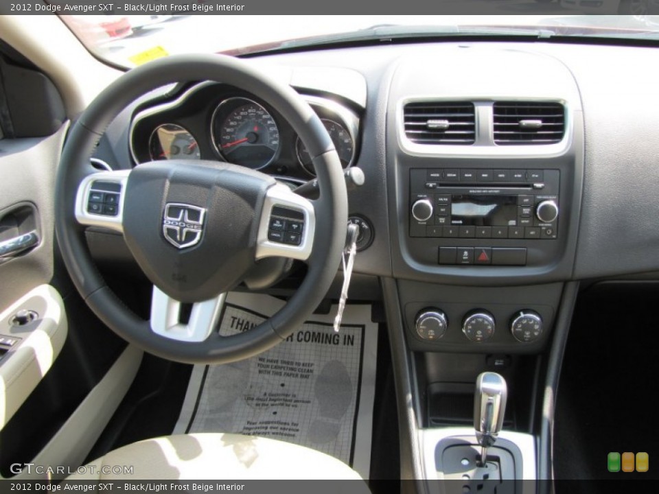 Black/Light Frost Beige Interior Dashboard for the 2012 Dodge Avenger SXT #53607213