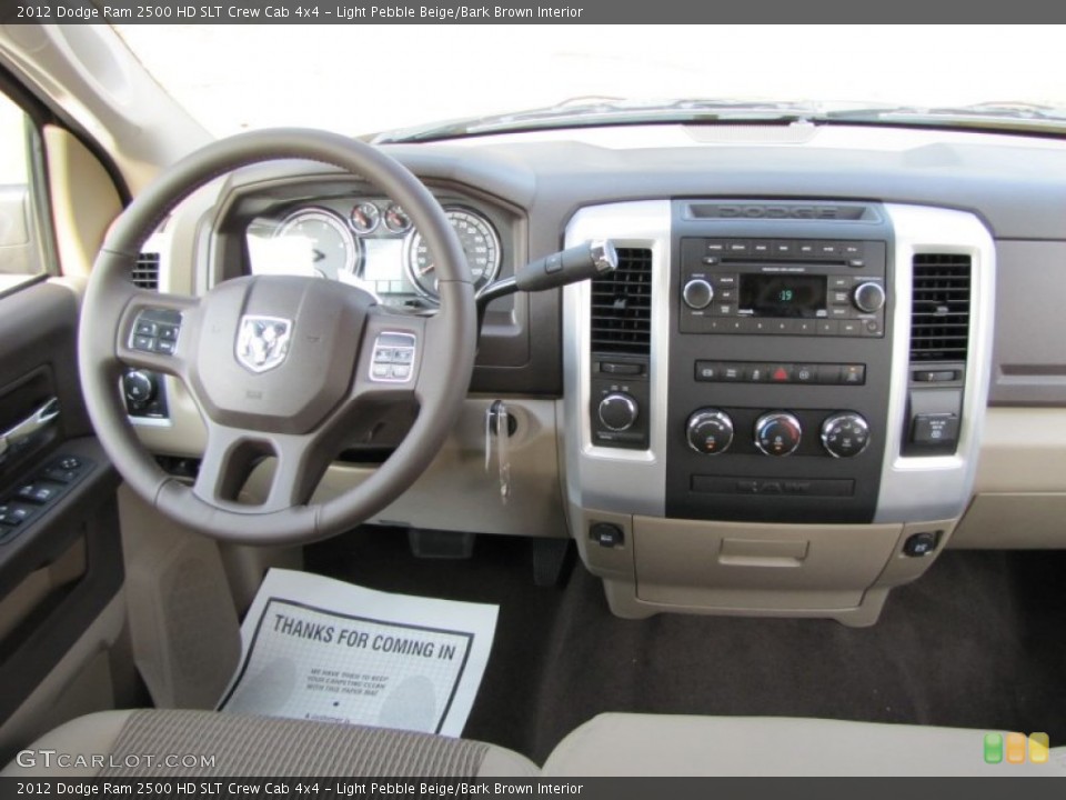 Light Pebble Beige/Bark Brown Interior Dashboard for the 2012 Dodge Ram 2500 HD SLT Crew Cab 4x4 #53609625
